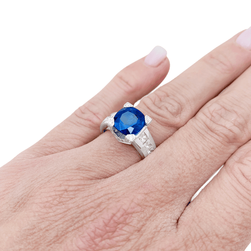 Bague 53 Bague en or blanc 750 sertie d’un saphir et diamants 58 Facettes 34263