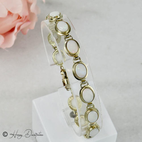 Bracelet Bracelet vintage en or jaune 14 carats et opales 58 Facettes 2556