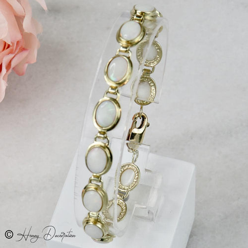 Bracelet Bracelet vintage en or jaune 14 carats et opales 58 Facettes 2556