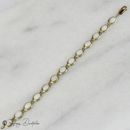 Bracelet Bracelet vintage en or jaune 14 carats et opales 58 Facettes 2556