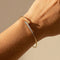 Armreif en or jaune 18 carats avec 12 diamants 58 Facettes