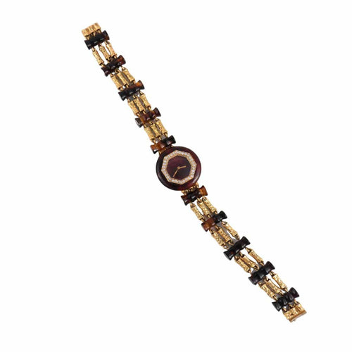 Montre Boucheron Paris - Montre en or et écaille de tortue 58 Facettes