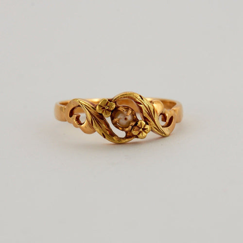 Bague 55 Bague en or jaune ajourée, centrée d'une perle 58 Facettes DV0014-4