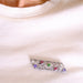 Brooch Diamond, tanzanite, red spinel and garnet brooch 58 Facettes DV0301-1