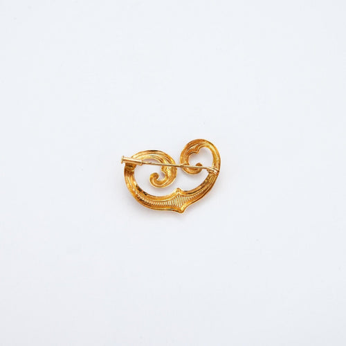 Broche Broche Volutes Or jaune 58 Facettes DV0088-7