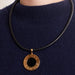 BULGARI Necklace - Pendant in Yellow Gold, Steel and Onyx 58 Facettes DV0395-1