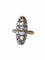 Bague marquise ancienne en or rose, argent, et diamants 58 Facettes