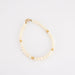 Bracelet Bracelet perles blanches et or jaune 58 Facettes P4L8