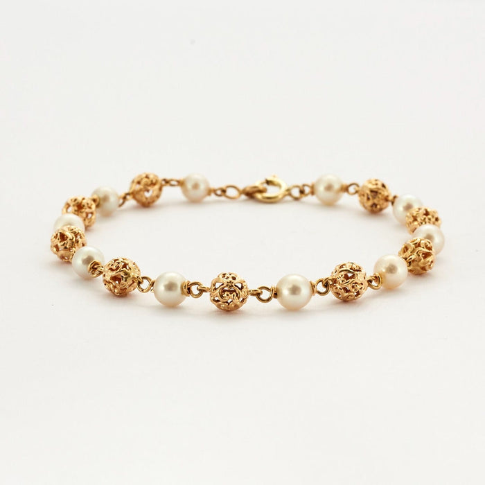 Bracelet Bracelet composé de perles en or jaune 58 Facettes DV0534-10