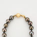 Collier Collier de perles grise de Tahiti. Fermoir en or jaune. 58 Facettes DV2336-1