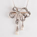 Collier Broche pendentif Noeud Diamants Perles 58 Facettes