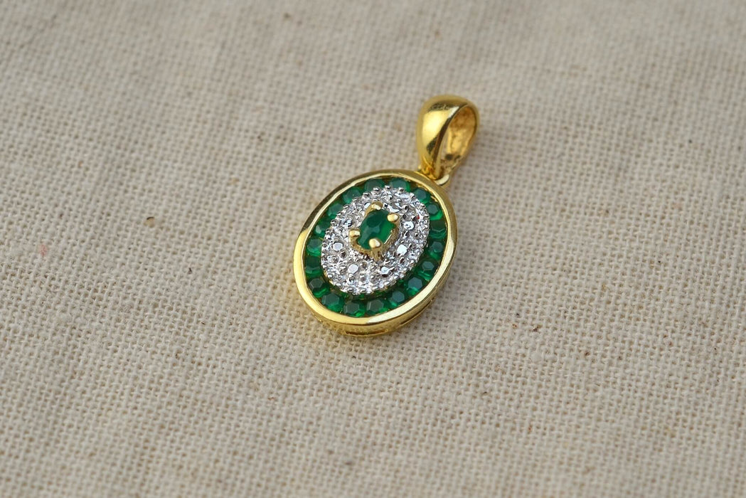 Pendentif Pendentif ovale, or jaune, émeraude 58 Facettes Ref1915