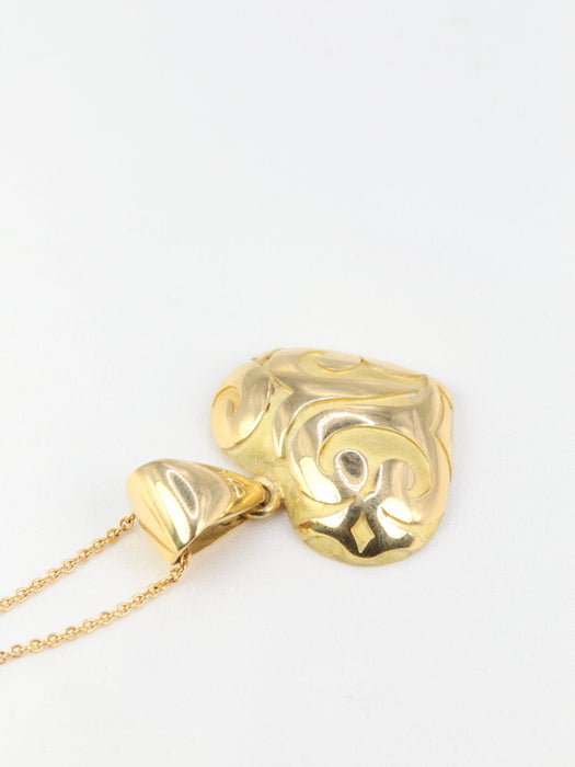 Pendentif Pendentif vintage cœur en or jaune 58 Facettes ZZ