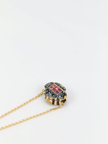 Pendentif Pendentif vintage en or, email et rubis 58 Facettes 303B