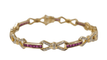 Bracelet Bracelet vintage en or jaune, rubis calibrés et diamants 58 Facettes 31672