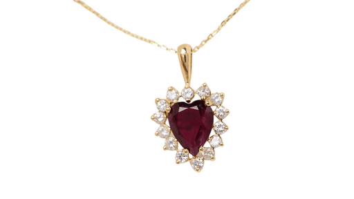 Collier Collier pendentif coeur or jaune, diamants et rubis 58 Facettes 32536