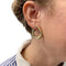 Boucles d'oreilles Boucles d'oreilles Boucheron, créoles, en or jaune. 58 Facettes 30025