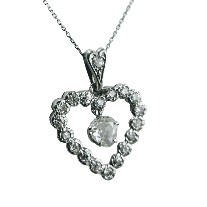 Pendentif Pendentif coeur en or blanc et diamants 58 Facettes 5603