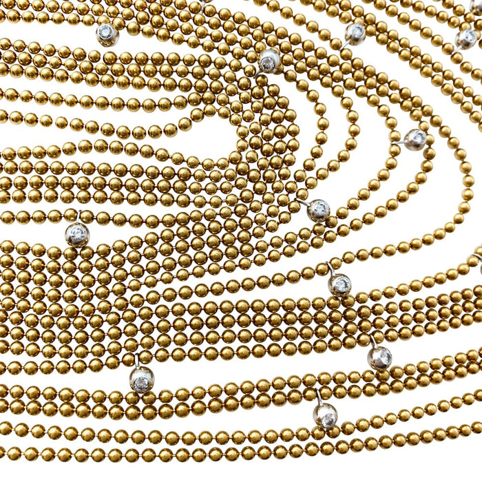 Cartier "Draperie" necklace in yellow gold, white gold and diamonds.