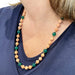 Long necklace with coral balls, chrysoprase, yellow gold spacers. 58 Facettes 30348