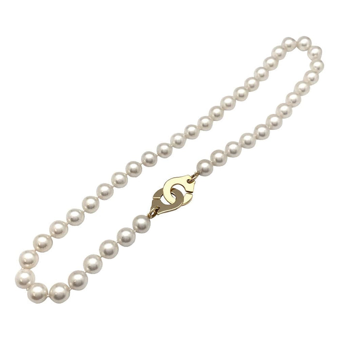 Collier Collier de perles Dinh Van "Menottes R15" en or jaune. 58 Facettes 30101