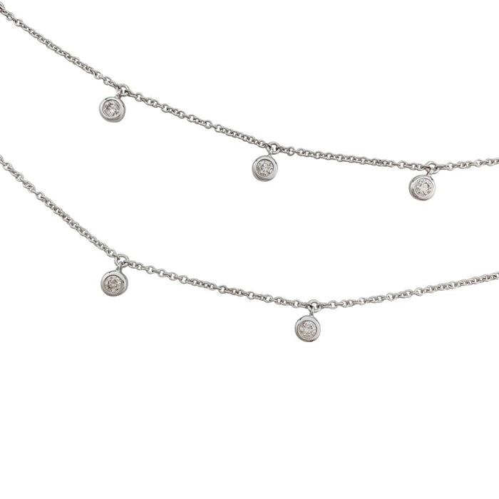 Drapery necklace in white gold and diamonds.
