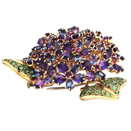 Clip Clip René Boivin "Bouquet de Violettes" or jaunes et pierres précieuses. 58 Facettes 28037