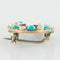 Broche Broche fer à cheval turquoises perles fines diamants 58 Facettes 19-222