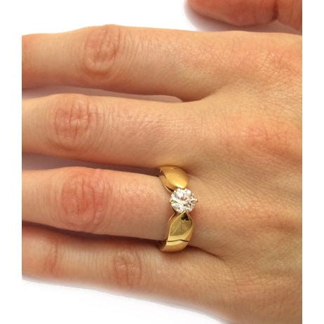 Chaumet "Plume" ring set with a 0,77 carat diamond E / VS2