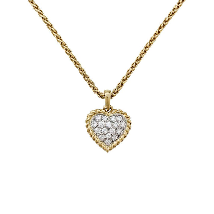 Pendentif et chaîne Van Cleef & Arpels "Coeur" en or jaune, platine et diamants.