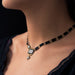 Collier Collier ancien plaques d'onyx et or 58 Facettes 20-140