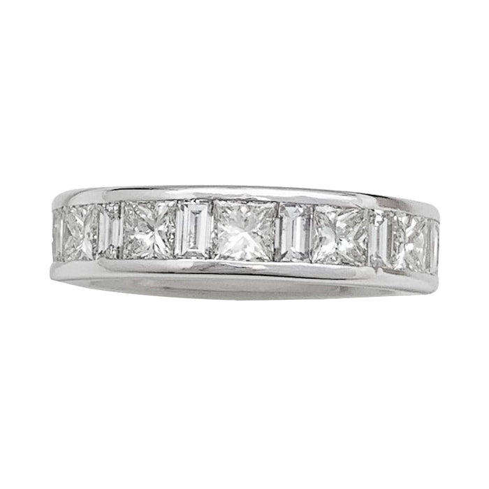 Half-round diamond wedding ring in white gold.
