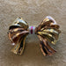 Brooch Knot brooch yellow & pink gold ruby ​​& diamonds 58 Facettes CEY26