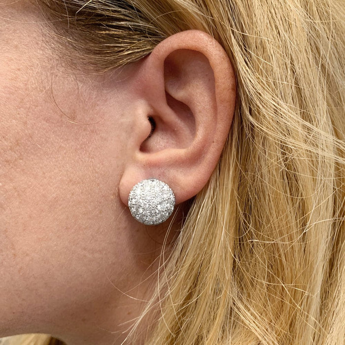 Half-sphere earrings in white gold and diamonds.
