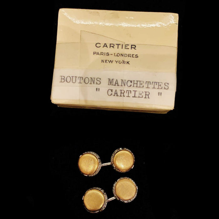 Boutons de manchette Cartier en platine, or jaune et diamants.