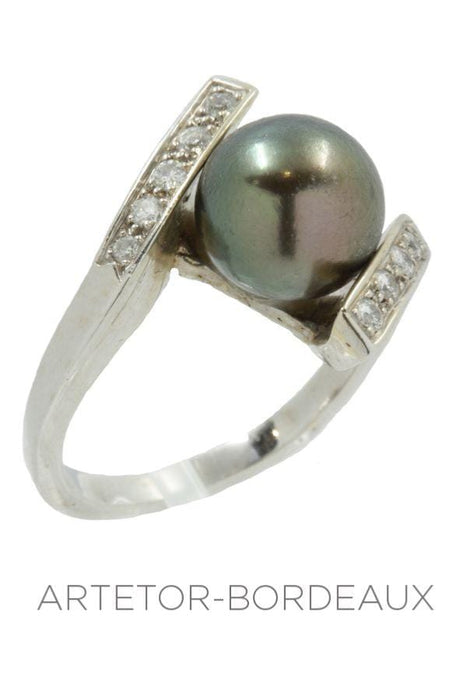 Modern black pearl and diamond ring