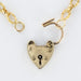 Old chiseled chain necklace and its heart-shaped padlock 58 Facettes CVCO3