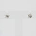 Stud earrings in diamonds and white gold 58 Facettes 21-317A