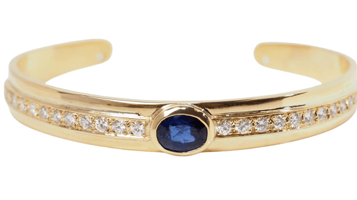 Bracelet Bangle bracelet in yellow gold, sapphire and diamonds 58 Facettes 32539