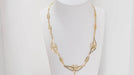 Necklace Drapery necklace in yellow gold 58 Facettes 31915