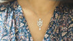 Collier Collier Art Déco en or platine et diamants 58 Facettes