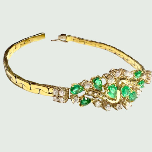 Bracelet Bracelet en or 18 kts au design contemporain de diamants et d'émeraudes 58 Facettes Q948A