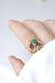 Ring Snake and clover ring, Sapphire, Emerald, Garnet 58 Facettes