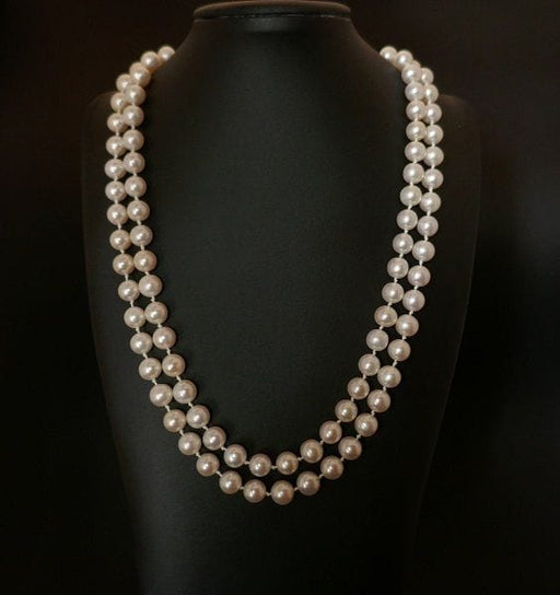 Collier Sautoir de perles de culture, fermoir en or 58 Facettes 1008824