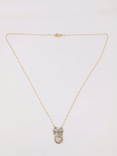 Collier Collier nœud Belle Epoque Or jaune Diamants Perle fine 58 Facettes 1022.5