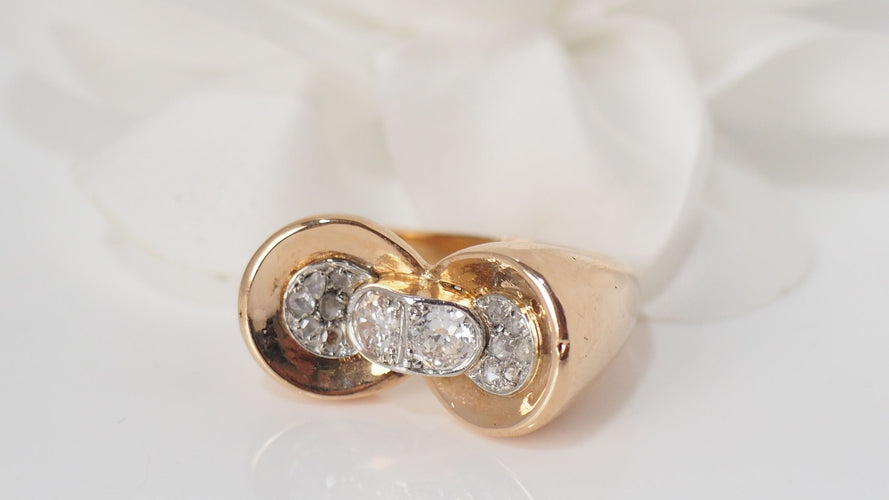 Bague Bague nœud en or rose platine et  diamants 58 Facettes 30247