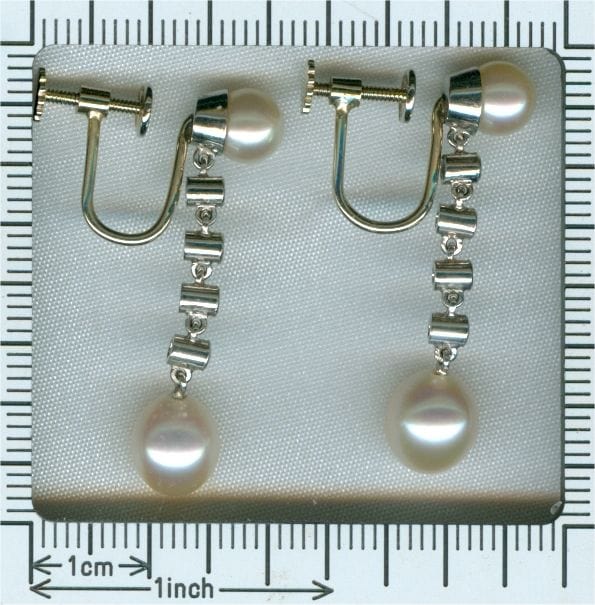 Boucles d'oreilles Boucles d'oreilles diamant et perle 58 Facettes 16046-0031