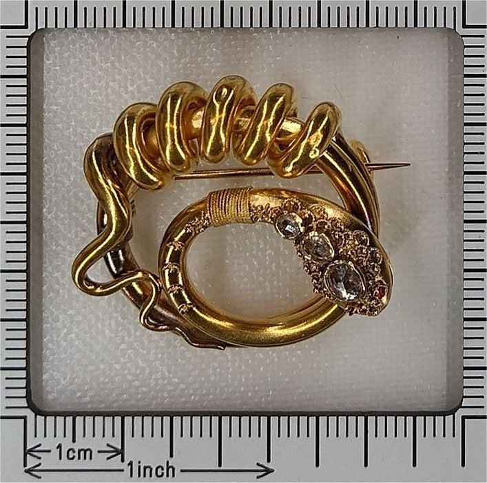 Broche Broche serpent, diamants, rubis 58 Facettes 23009-0010