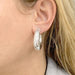 Chaumet Creole earrings, “Anneau”, white gold. 58 Facettes 33187