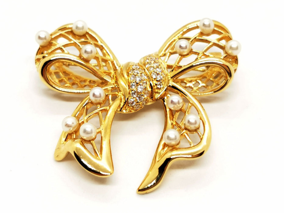 Broche Broche Noeud Or jaune Perle 58 Facettes 1653935CN